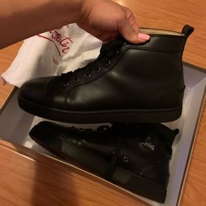 Worn men’s Louboutin sneakers